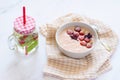 Strawberry yogurt and ripe strawberry on a white table Royalty Free Stock Photo