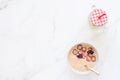 Strawberry yogurt and ripe strawberry on a white table Royalty Free Stock Photo