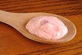 Strawberry Yogurt on a Wooden Spoon Royalty Free Stock Photo