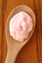 Strawberry Yogurt on a Wooden Spoon Royalty Free Stock Photo