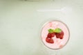 Strawberry yogurt with strawberry on wooden