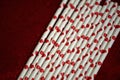 Bundle of straws with printed hearts. Royalty Free Stock Photo