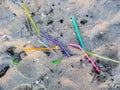 Straws are waste on beach Royalty Free Stock Photo