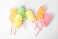 Straws with yummy cotton candy on white background Royalty Free Stock Photo