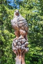 Strbske Pleso, Slovakia - July 16, 2023: Eagle wood carved statue in Strbske Pleso at Tatra Mountains Royalty Free Stock Photo