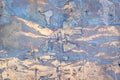 Streaks of blue and beige paint on iron sheet. Abstract spotted patterned background Royalty Free Stock Photo