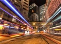 Streaks of Car Lights on Busy Road at Night in Hong Kong Royalty Free Stock Photo