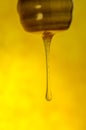 Stream of honey flows. Stream of pouring honey Royalty Free Stock Photo