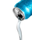 Stream of mineral water pours from a metal bottle isolated on a white background