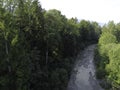 Stream in a natural area in Upper Bavaria with barrages and large stones at sunrise Royalty Free Stock Photo