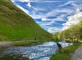 Stream and people on the bay in Dovedale valley, Derbyshire, UK Royalty Free Stock Photo