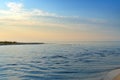 Stream in the sea strait at sunset background