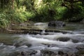 Beautiful little waterfalls with silky smooth water flowing over the rocks Royalty Free Stock Photo