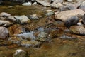Stream Water Flows Over Rocks Royalty Free Stock Photo