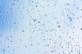 Stream of water in heavy rain. Raindrops on window pane. Royalty Free Stock Photo