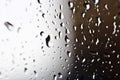 Stream of water in heavy rain. Raindrops on window pane. Royalty Free Stock Photo