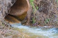 A stream of water running from a pipe Royalty Free Stock Photo