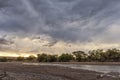 Stream on the way to the Namibia Desert, Stormy sky. Royalty Free Stock Photo