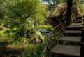 Stream and Wooden steps Royalty Free Stock Photo