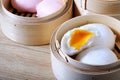 Streamed chinese buns, Dim Sum in round bamboo crate