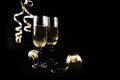 Streamers, Christmas decorations and glasses with champagne Royalty Free Stock Photo