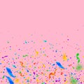 Streamers and confetti. Colorful tinsel and foil ribbons. Confetti gradient on pink background. Royalty Free Stock Photo