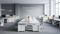 Modern Open Plan Office Interior With Rows Of Desks Computers And Natural Light Streaming Through Large Windows Royalty Free Stock Photo
