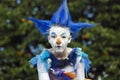 Street actor dressed like a fairy bird. Royalty Free Stock Photo