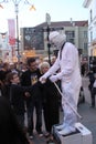 Man in white - living statue handshake