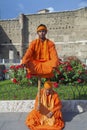 Street actors costumed as Indian Yogi