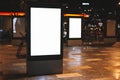 Street advertising mock up template with copy space. Outdoor commercial banner with white empty display on the night