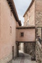 street of AlbarracÃÂ­n with gallery that connects two facing buildings, Teruel, Spain