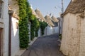 The street of Alberobello with trulli. Alberobello. Puglia. Ital