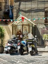 Street altar in honor of Padre Pio in Naples. Campania, Italy.