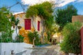 Street of Anafiotika in the old town of Athens, Greece. Anafiotika is district built by workers from the island Anafi. Royalty Free Stock Photo