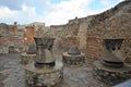 Remains of the bakery in ruins of Pompeii, Italy