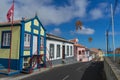 Street in Angra do Heroismo with a blue and yellow typical shrine in Imperio, Terceira, Azores