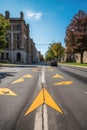 street arrows on asphalt indicating directions