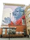 Street art by city artist Gijs Van Hee at