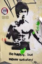 A street art graffiti painting representing martial artist Bruce Lee in London Royalty Free Stock Photo