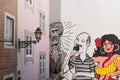 Street art and Graffiti of portuguese fado on a street of Lisbon, Portugal Royalty Free Stock Photo