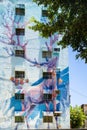 Street Art in Lingya District, Kaohsiung, Taiwan. Colorful graffiti of deer in forest on walls in Kaohsiung, Taiwan.