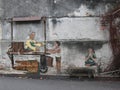 Street art mural called ÃÂ´Old lady selling Susu Soya Asli & Segar