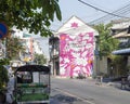 Street art mural by Romanian artist Aitch in Chinatown, Bangkok, Thailand