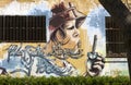 Street art murals by Spanish graffiti mural artist in Montjuic Park, Barcelona, Spain.