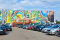 Street art on Oktyabrskaya street. Graffiti with natural motifs on wall of industrial building, Minsk, Belarus