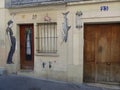 Street art painting on a facade of a building of Montmartre in Paris, France. Royalty Free Stock Photo