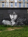 Street art portrait of famous Soviet rock musician Viktor Tsoi on the wall of a house. Royalty Free Stock Photo