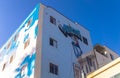 Street art at Venice Beach, Los Angeles, California. Colorful building with graffiti on blue sky background Royalty Free Stock Photo