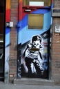 Street art on wall at Brick Lane, Shoreditch, London